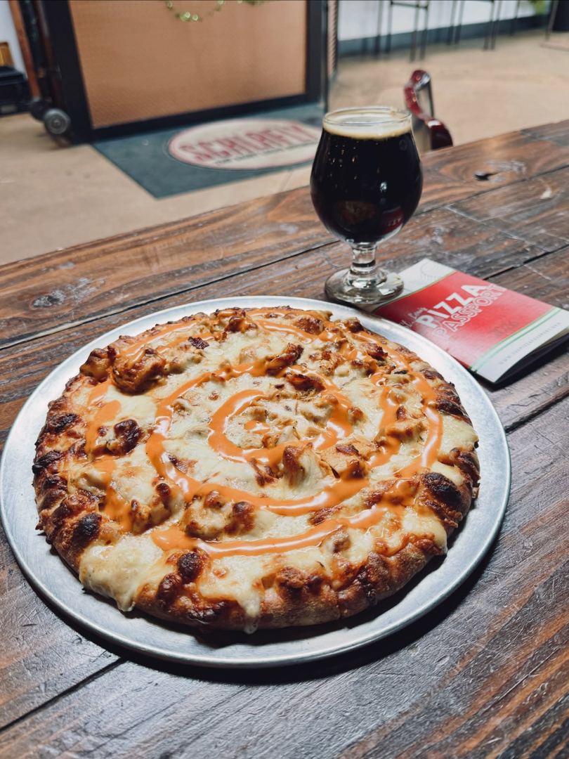 Pizza and a beer with the passport